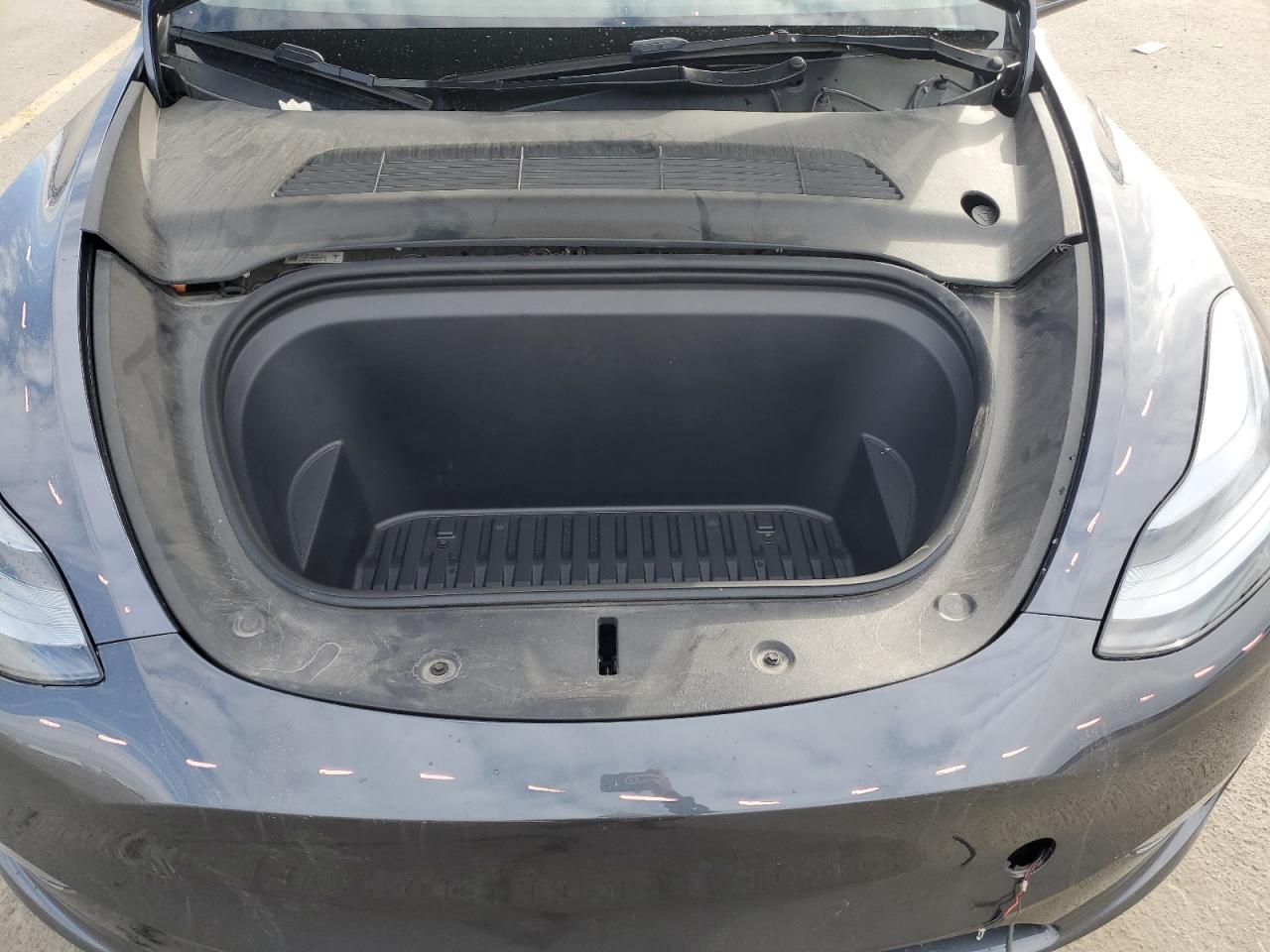 2023 Tesla Model Y VIN: 7SAYGAEE3PF712185 Lot: 91290195