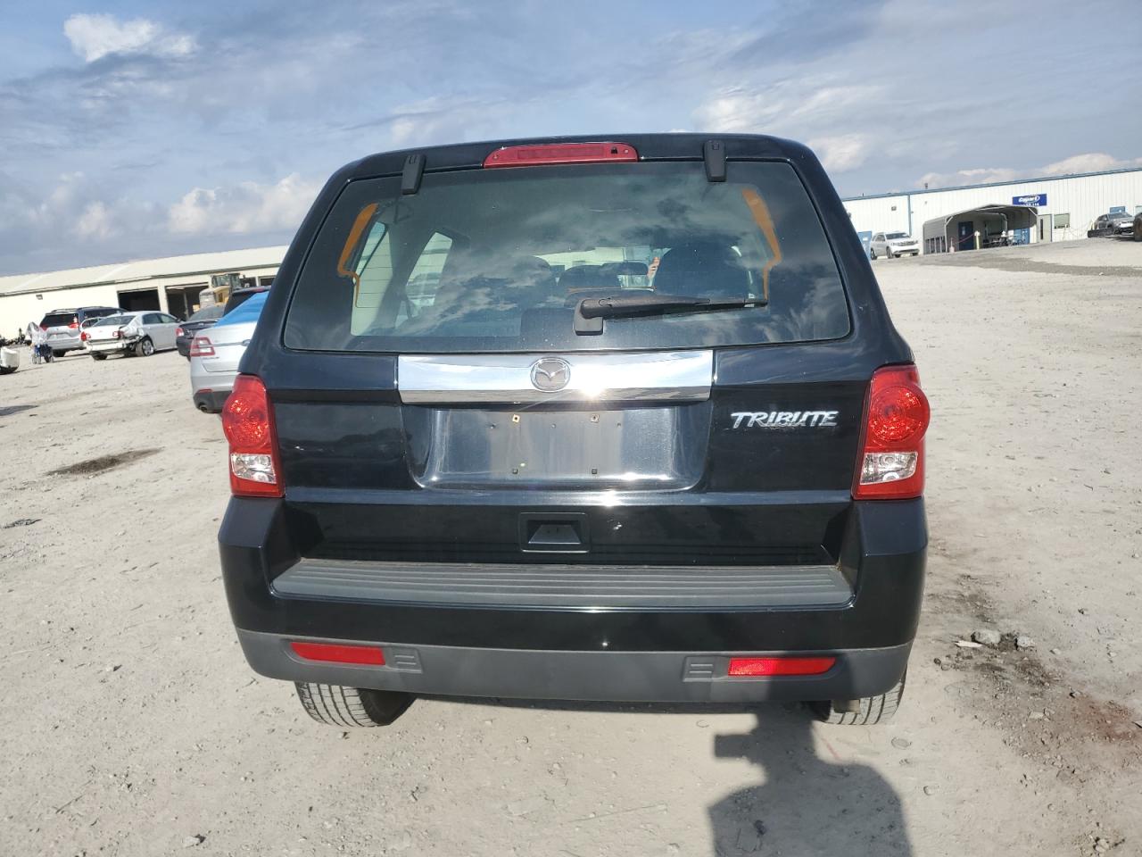 2010 Mazda Tribute I VIN: 4F2CY0C76AKM02299 Lot: 91715025