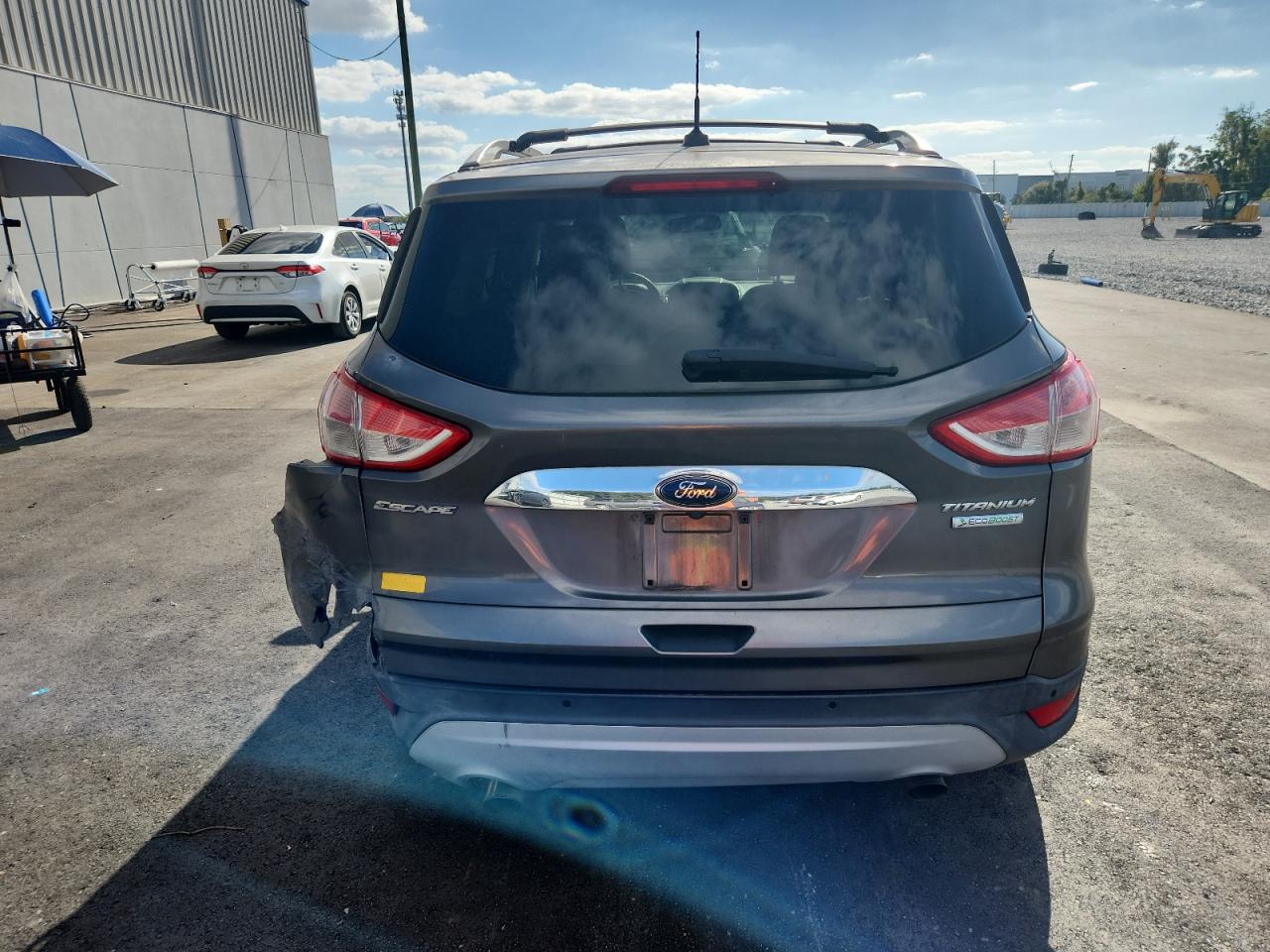 2014 Ford Escape Titanium VIN: 1FMCU0J99EUA85771 Lot: 91504045