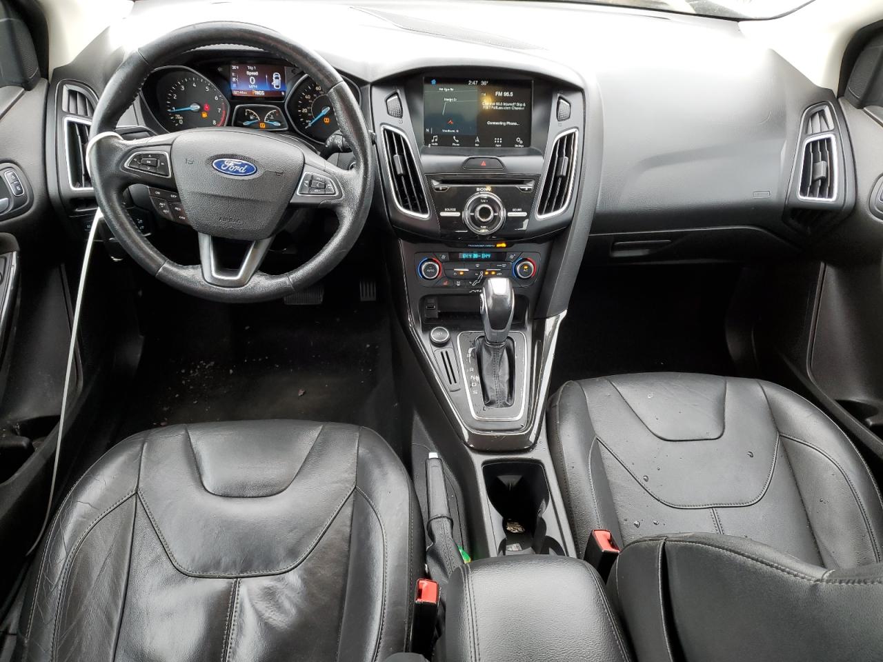 2016 Ford Focus Titanium VIN: 1FADP3N23GL238822 Lot: 92067655