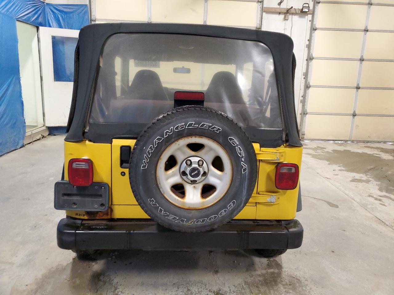 2000 Jeep Wrangler / Tj Sport VIN: 1J4FA49S5YP738716 Lot: 92010385