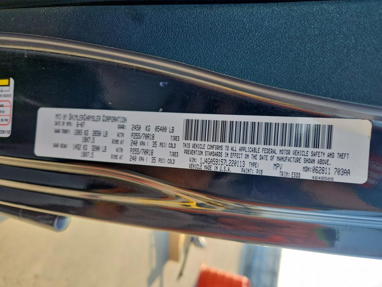 2007 Jeep Wrangler Sahara VIN: 1J4GA59157L220113 Lot: 93148055