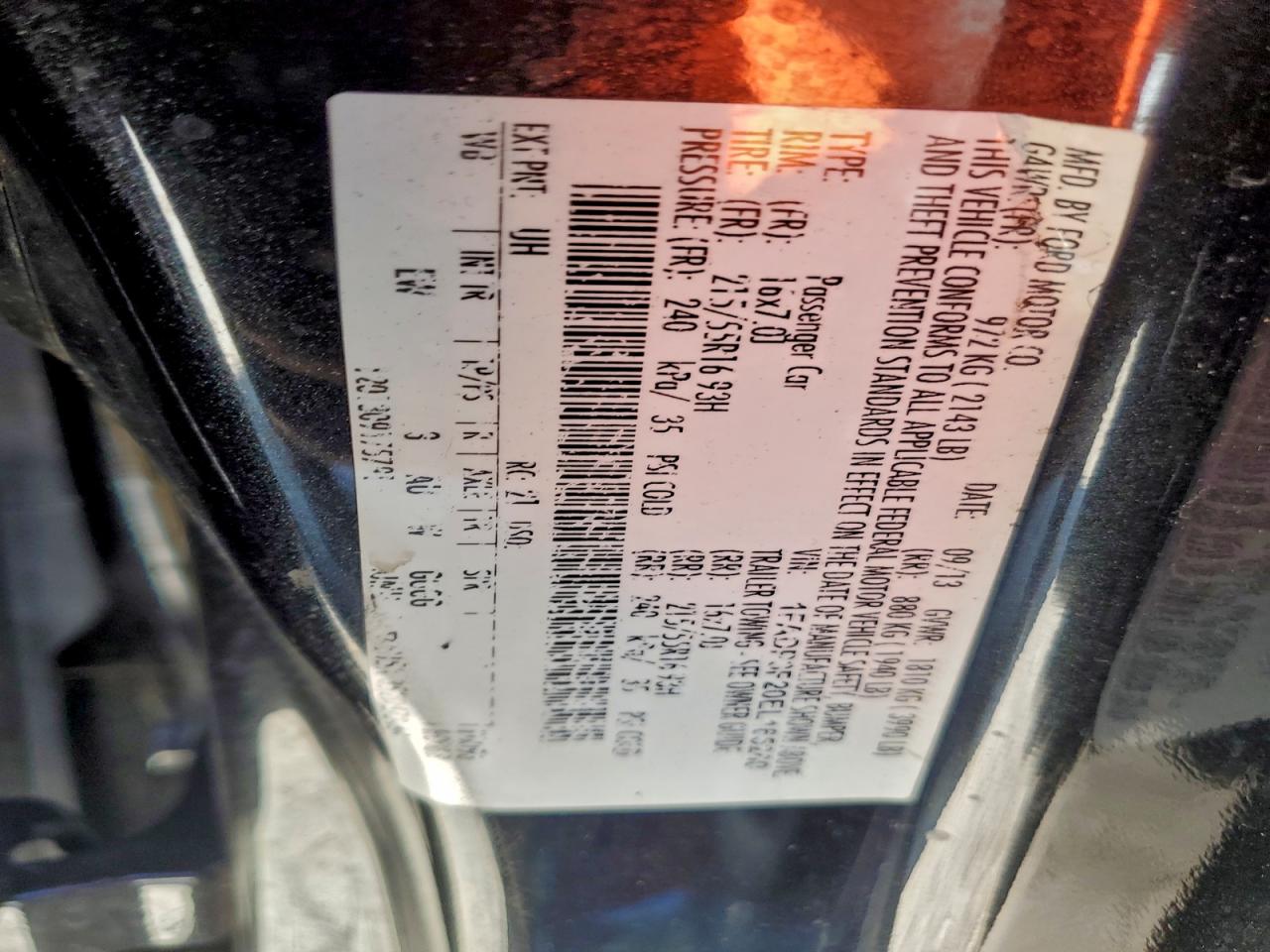 2014 Ford Focus Se VIN: 1FADP3F20EL165260 Lot: 94064565