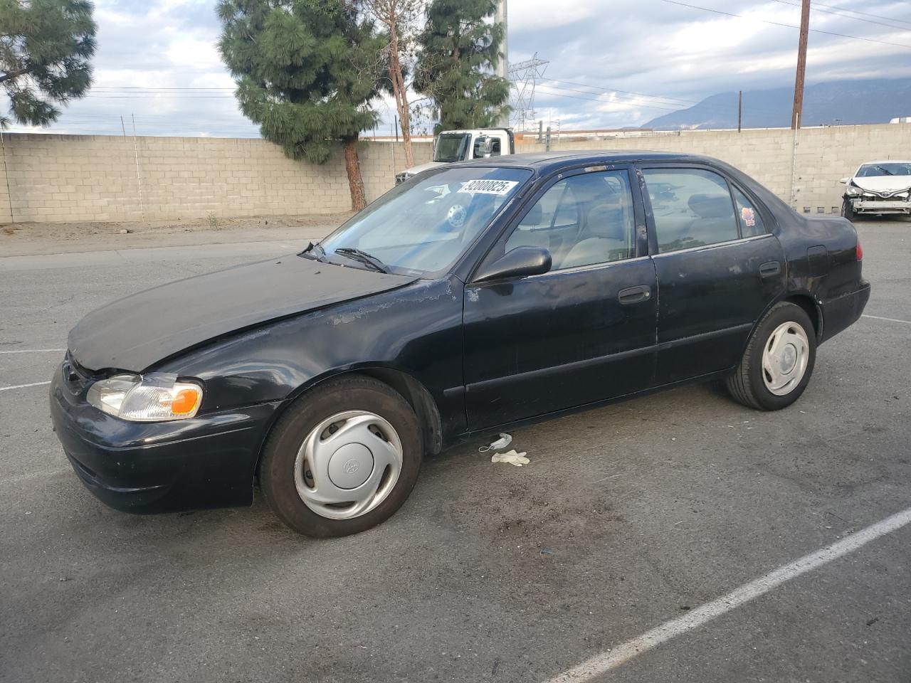 1NXBR12E4YZ304090 TOYOTA COROLLA Photo 1