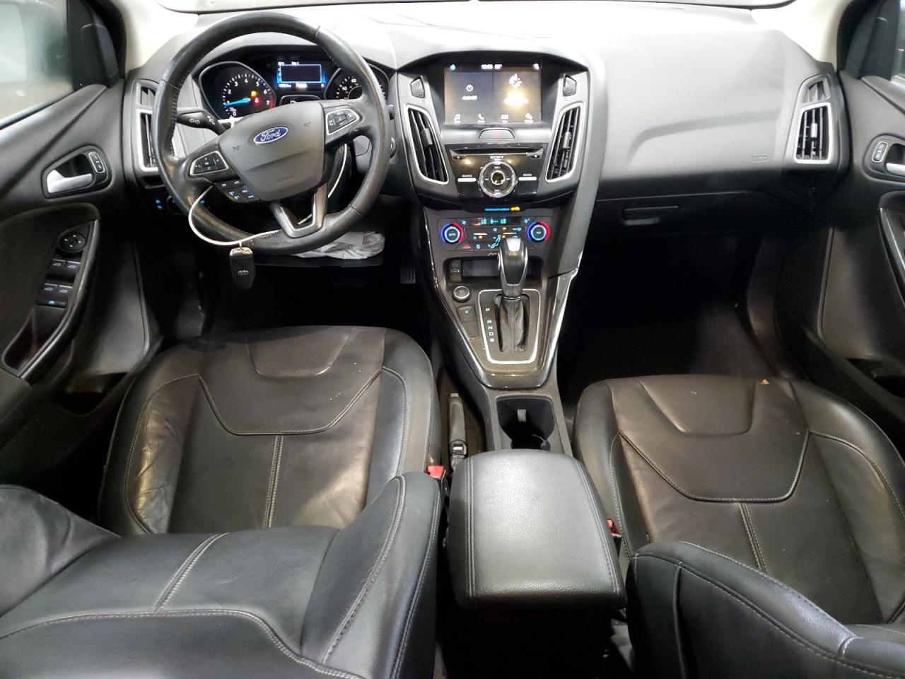 2017 Ford Focus Titanium VIN: 1FADP3J20HL238784 Lot: 92239965