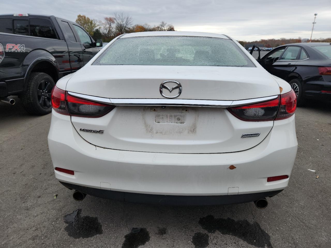 2014 Mazda 6 Sport VIN: JM1GJ1U69E1147046 Lot: 90347755