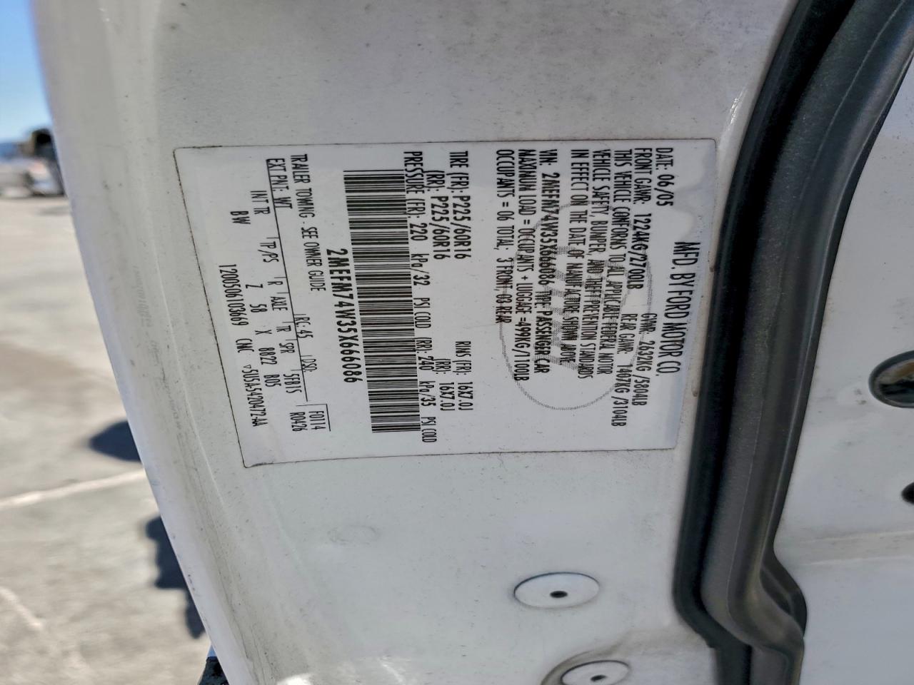 2005 Mercury Grand Marquis Gs VIN: 2MEFM74W35X666086 Lot: 92672645