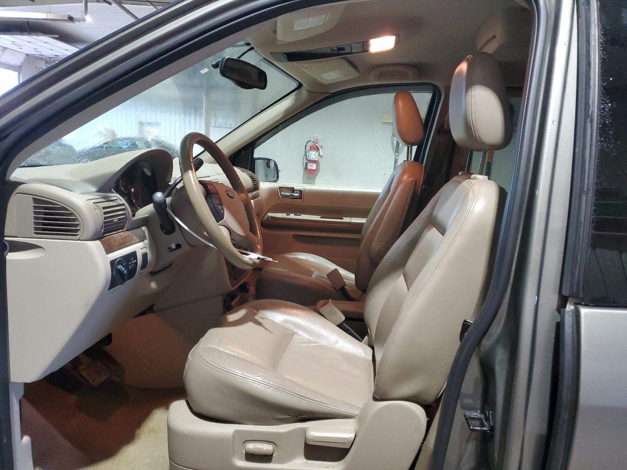 2004 Ford Freestar Limited VIN: 2FMZA58264BB24586 Lot: 92603525