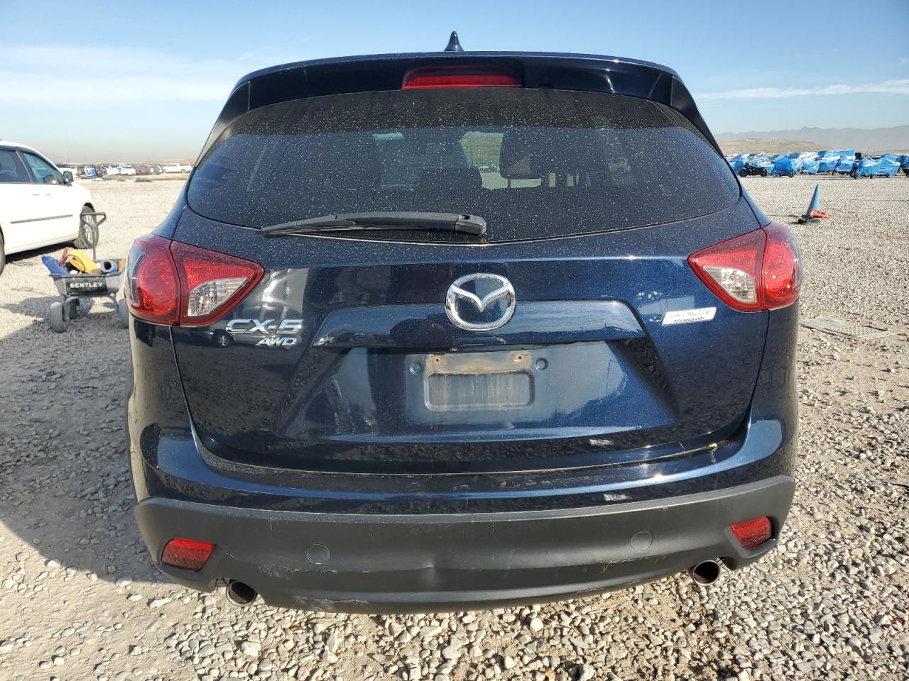 2015 Mazda Cx-5 Touring VIN: JM3KE4CY3F0531308 Lot: 92413265