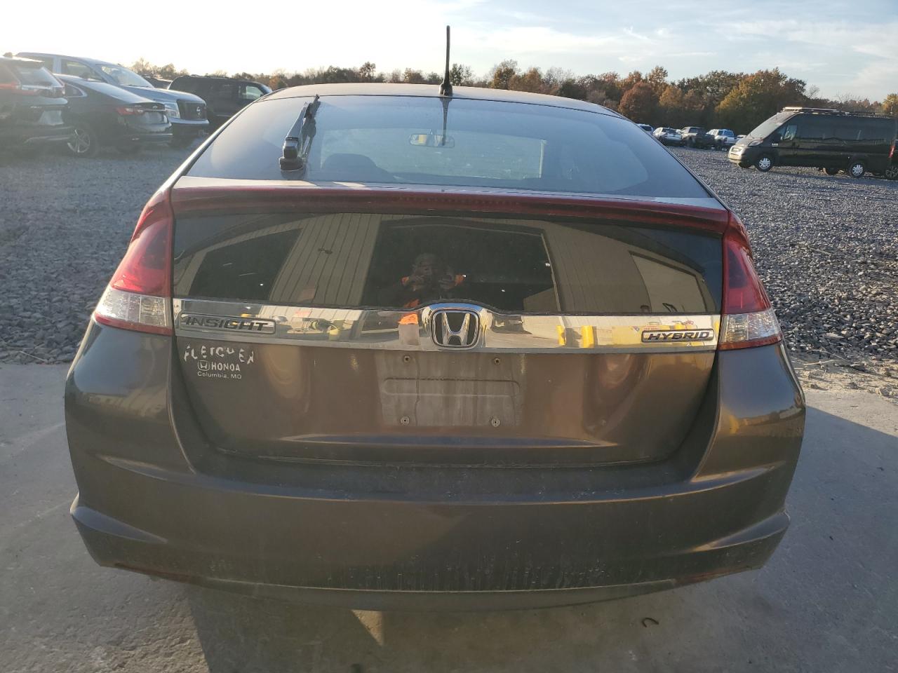 2012 Honda Insight Ex VIN: JHMZE2H75CS004879 Lot: 91643635