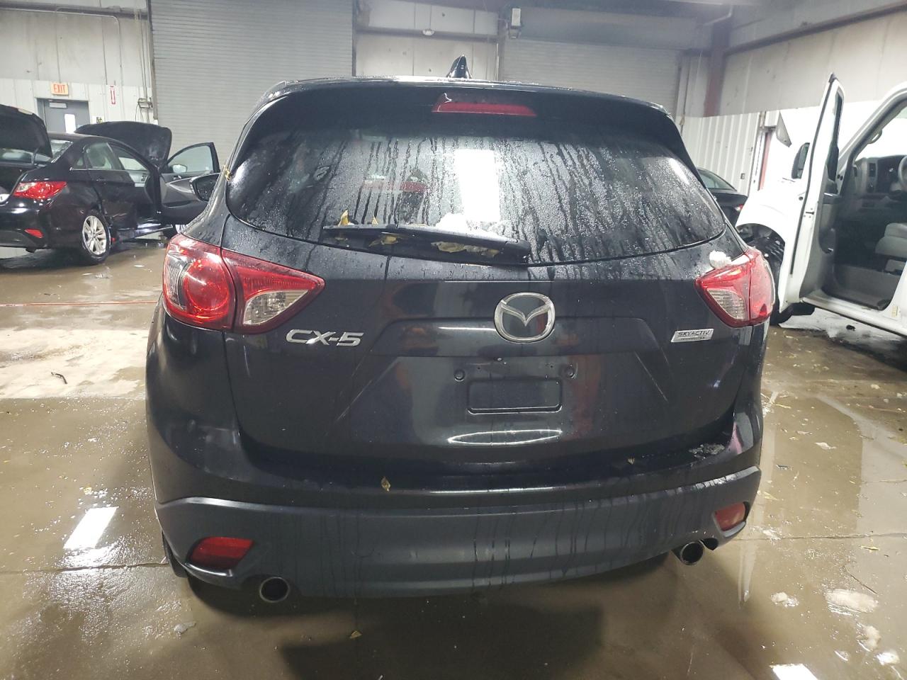 2014 Mazda Cx-5 Touring VIN: JM3KE2CY8E0354113 Lot: 91895205