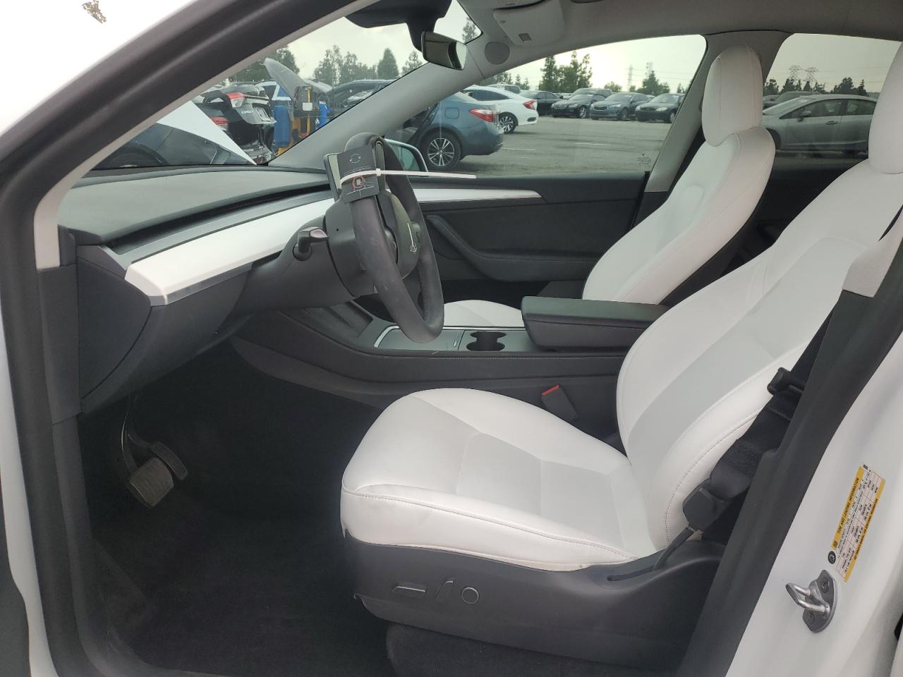 2023 Tesla Model Y VIN: 7SAYGAEE2PF588006 Lot: 90935785