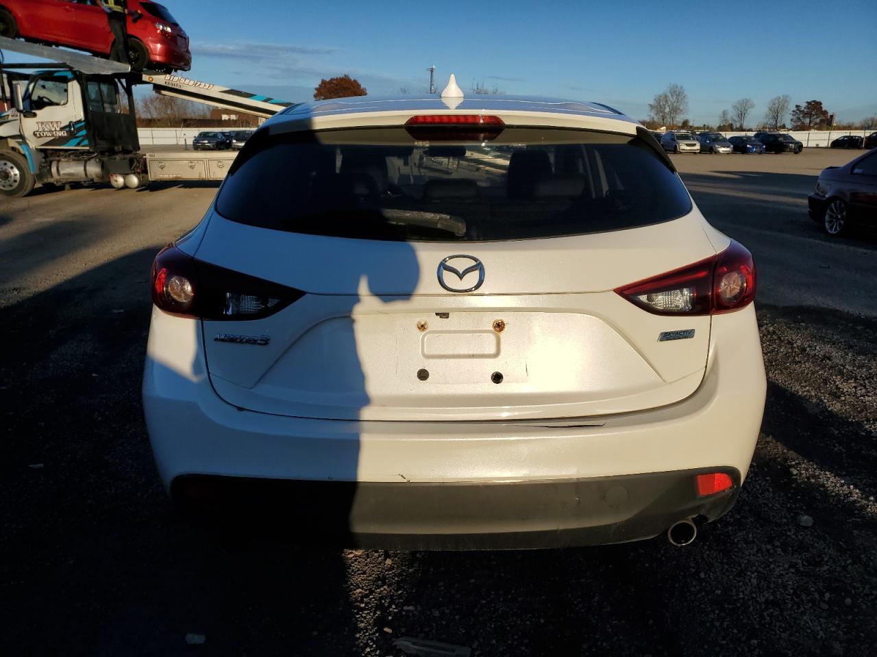 2016 Mazda 3 Touring VIN: JM1BM1M36G1306485 Lot: 90287475