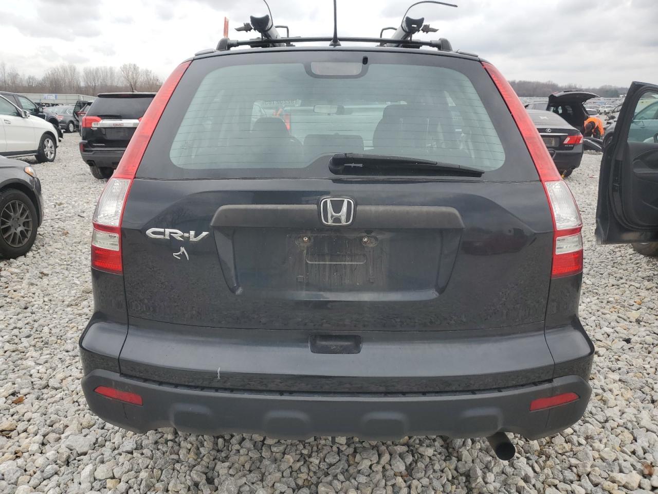 2009 Honda Cr-V Lx VIN: 3CZRE38369G703517 Lot: 92252185