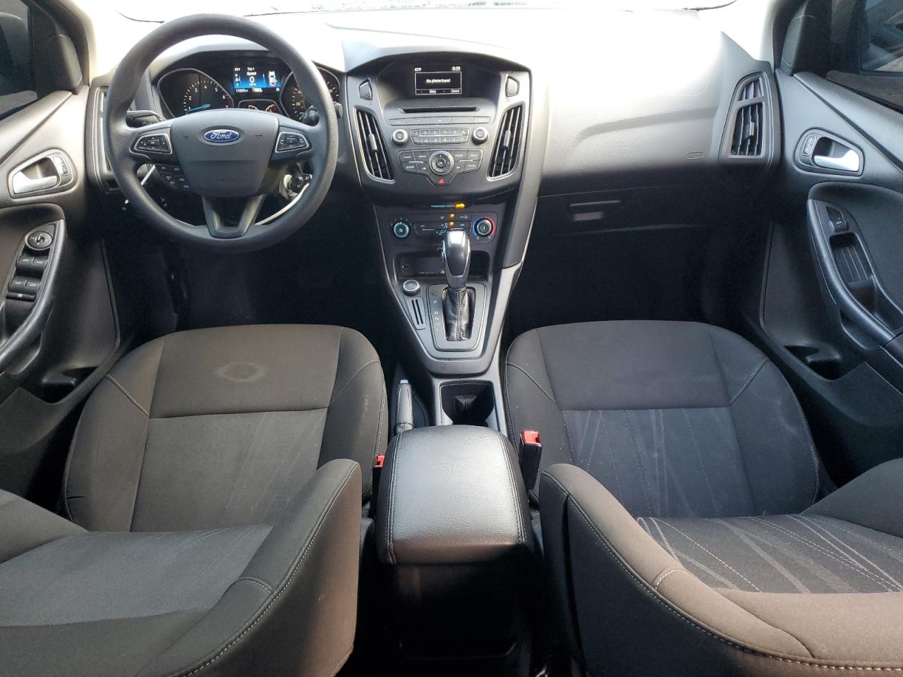 2015 Ford Focus Se VIN: 1FADP3F21FL201801 Lot: 92219945