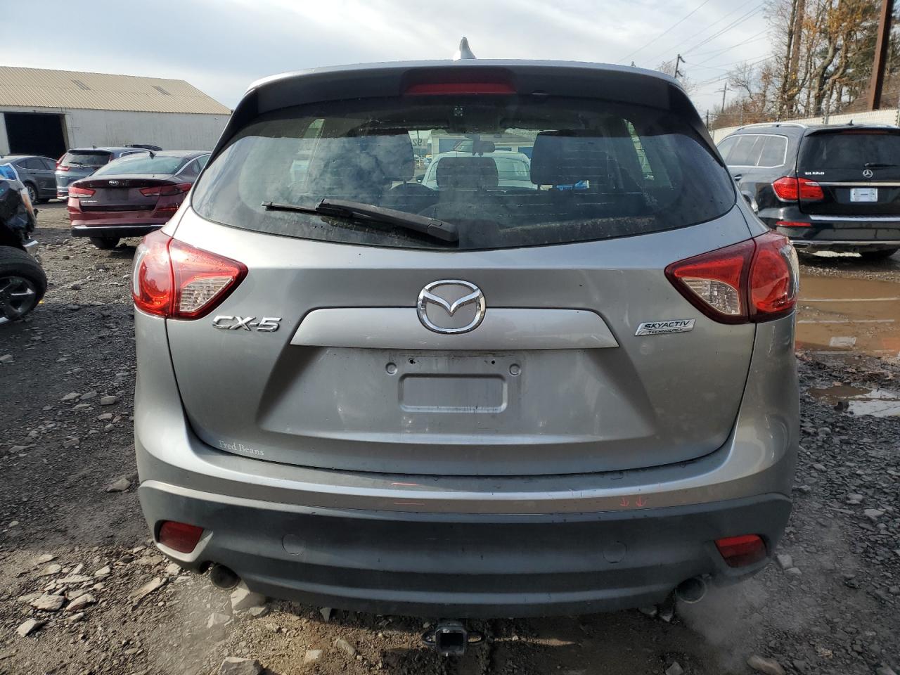 2014 Mazda Cx-5 Sport VIN: JM3KE2BE9E0408381 Lot: 92747965