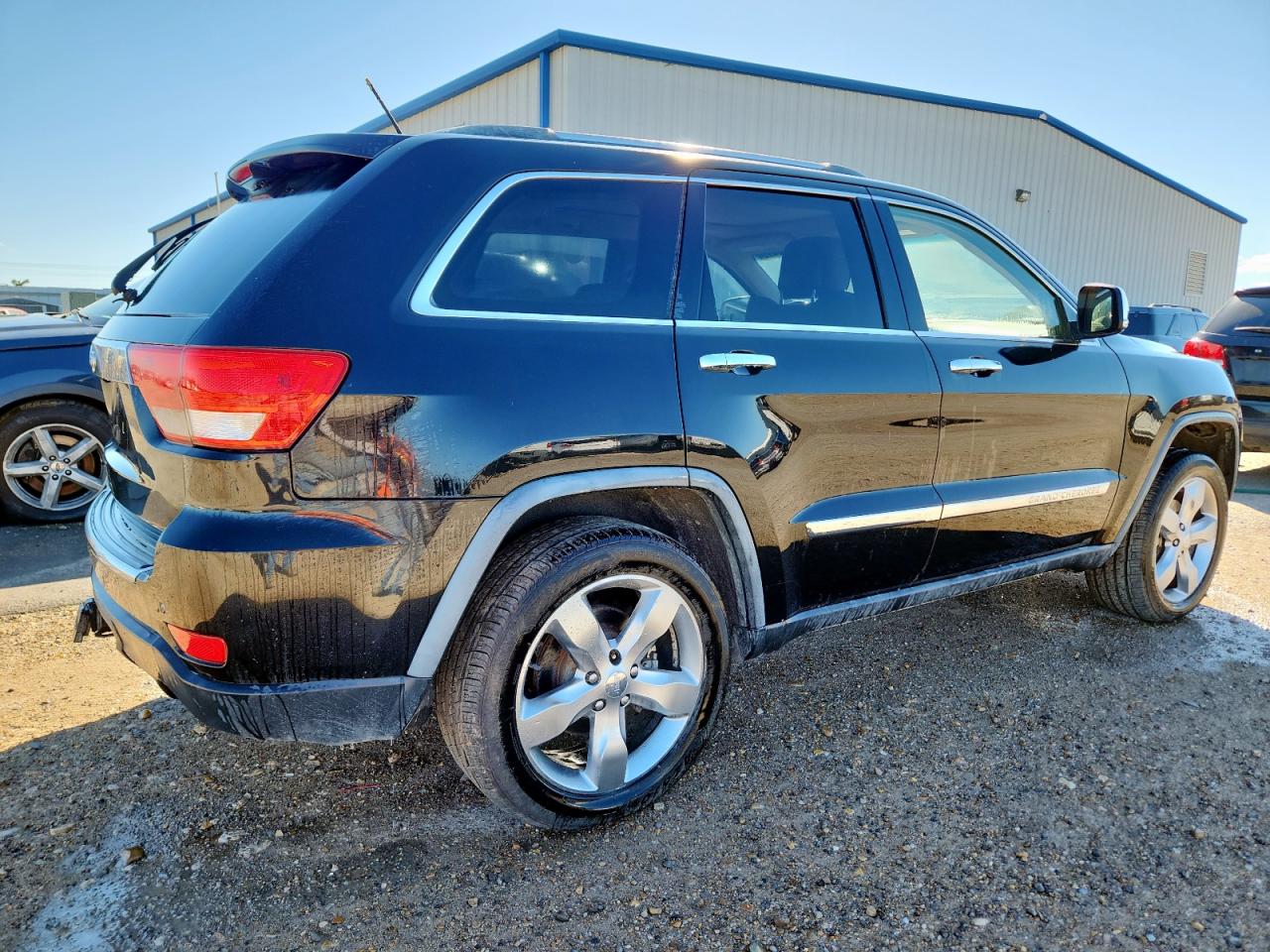 2011 Jeep Grand Cherokee Overland black suv flexible 1J4RR6GG0BC641776 photo #4