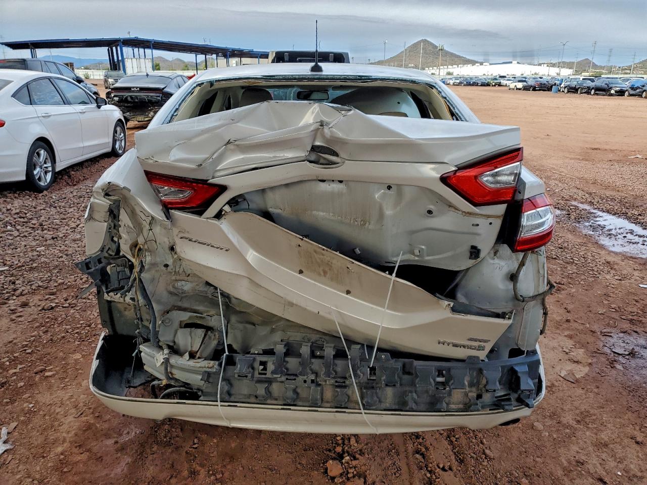 2013 Ford Fusion Se Hybrid VIN: 3FA6P0LUXDR144929 Lot: 93900425