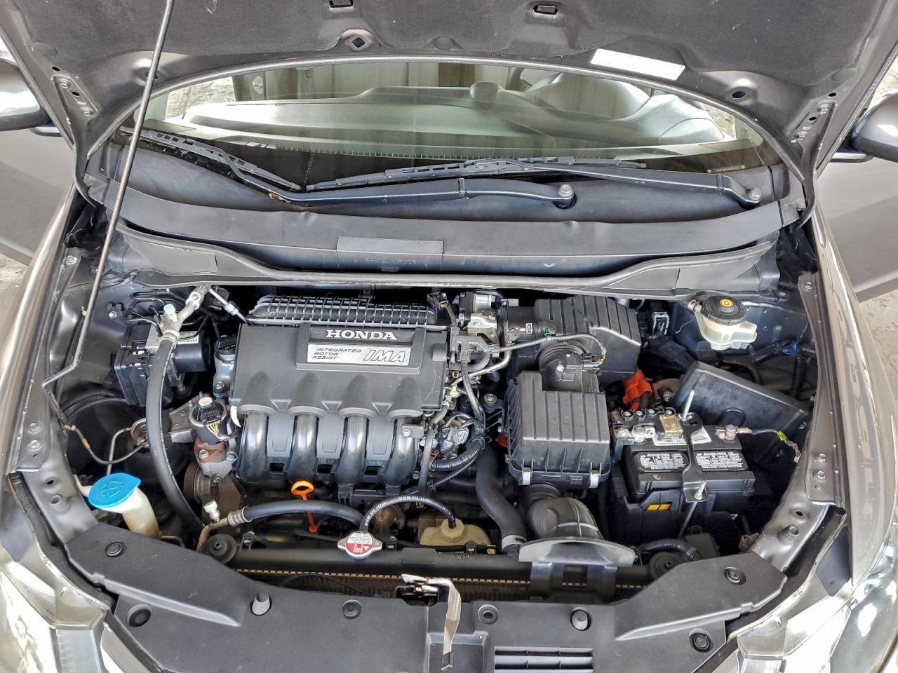 2010 Honda Insight Ex VIN: JHMZE2H75AS002627 Lot: 93742245