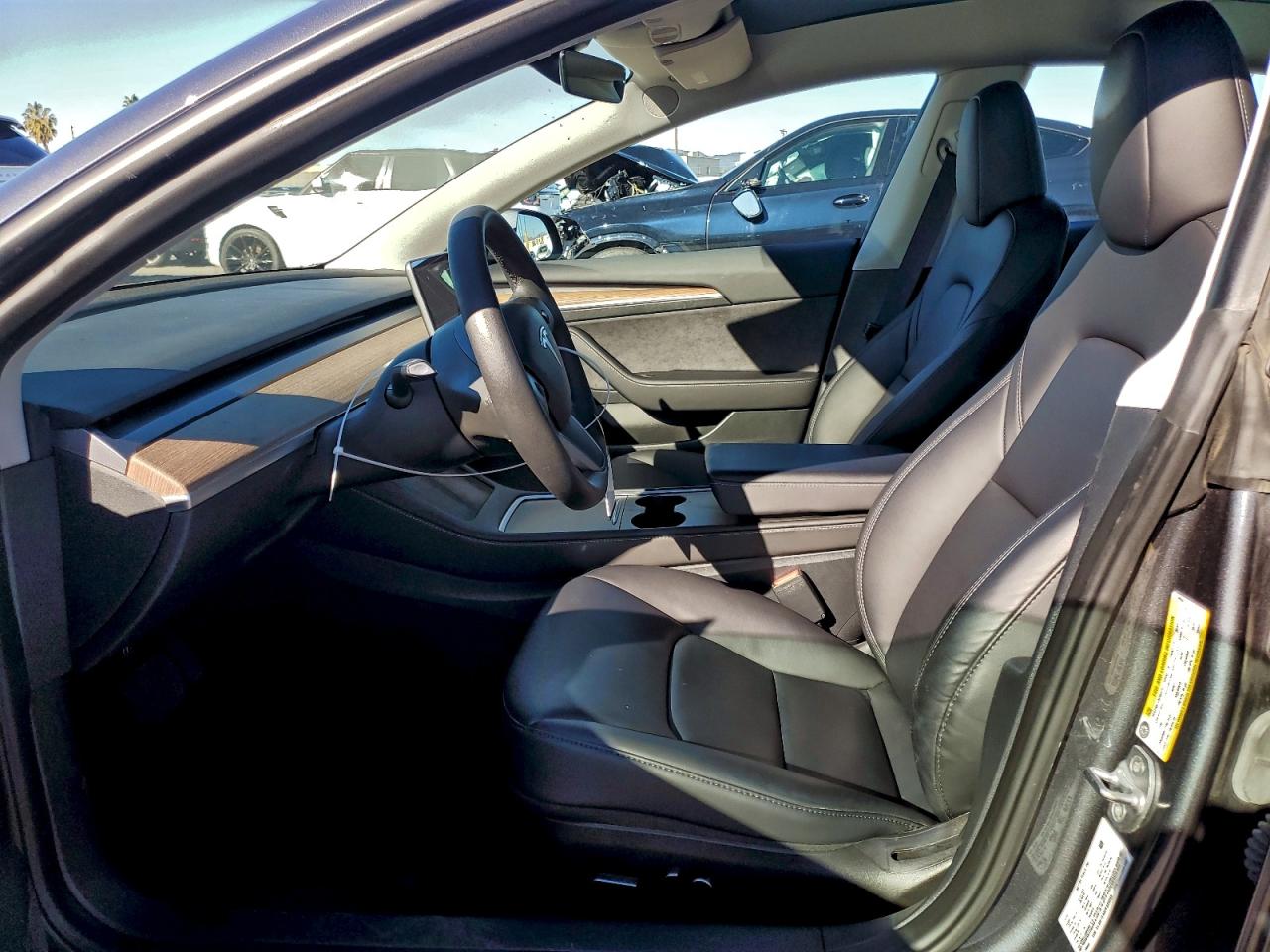 2023 Tesla Model 3 VIN: 5YJ3E1EA8PF699945 Lot: 94177565