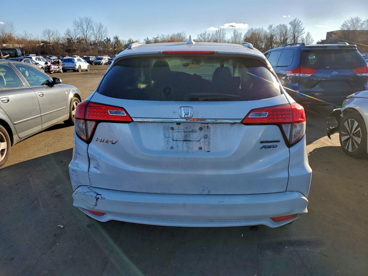 2019 Honda Hr-V Touring VIN: 3CZRU6H99KM700451 Lot: 93778295