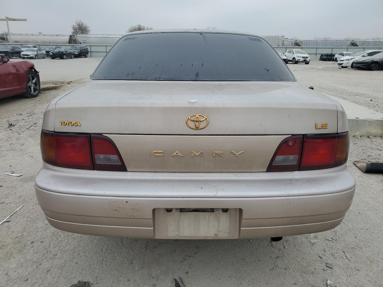 1995 Toyota Camry Le VIN: 4T1SK12E5SU537102 Lot: 93472415