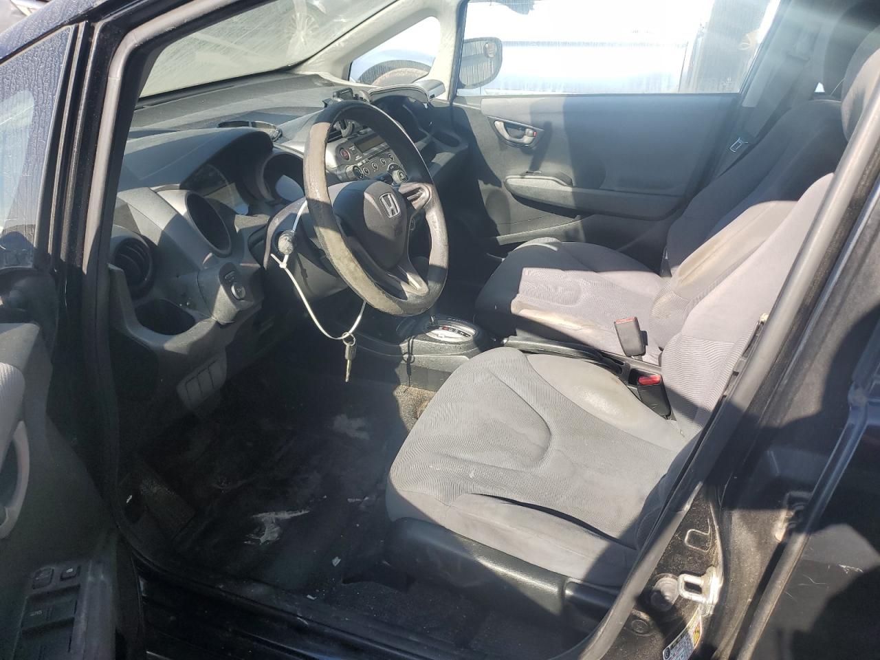 2009 Honda Fit VIN: JHMGE88269S016451 Lot: 93055975