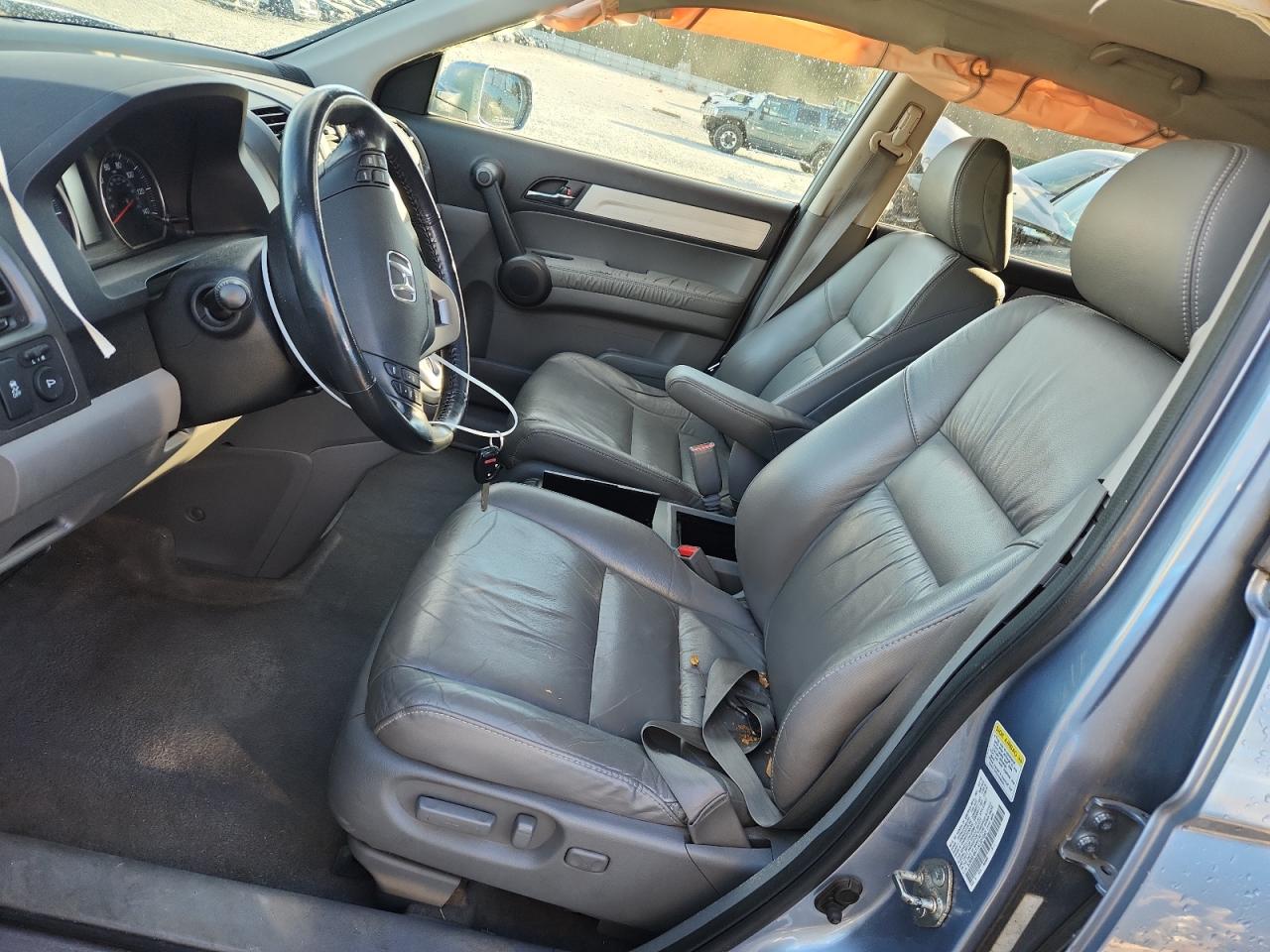 2010 Honda Cr-V Exl VIN: 5J6RE4H71AL031043 Lot: 92630585