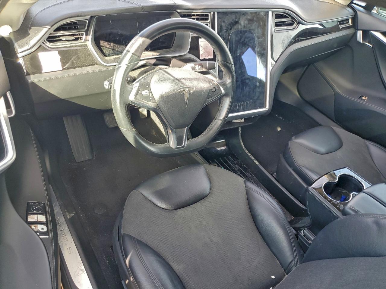 2014 Tesla Model S VIN: 5YJSA1H14EFP63401 Lot: 94279445