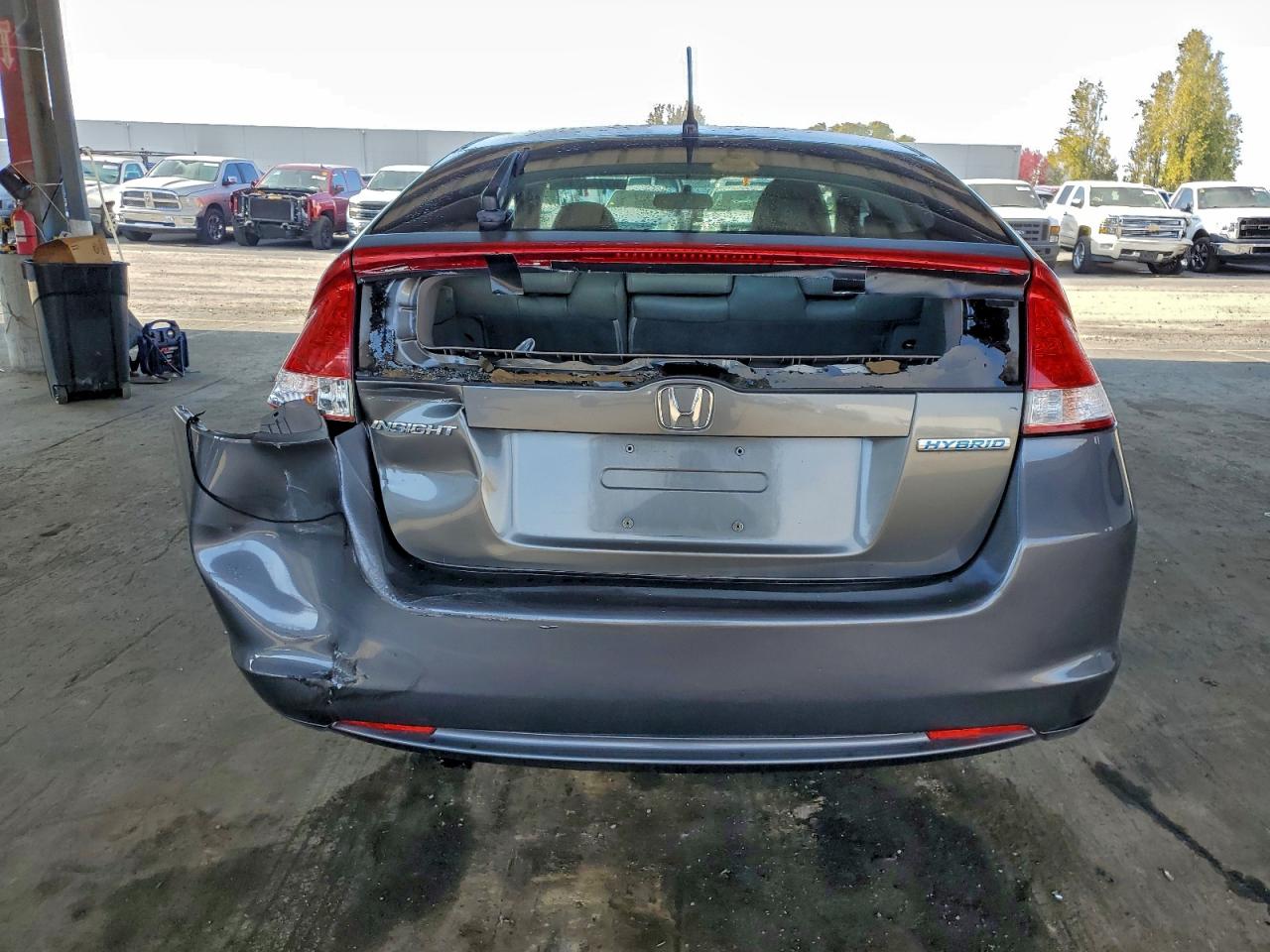 2010 Honda Insight Ex VIN: JHMZE2H75AS002627 Lot: 93742245