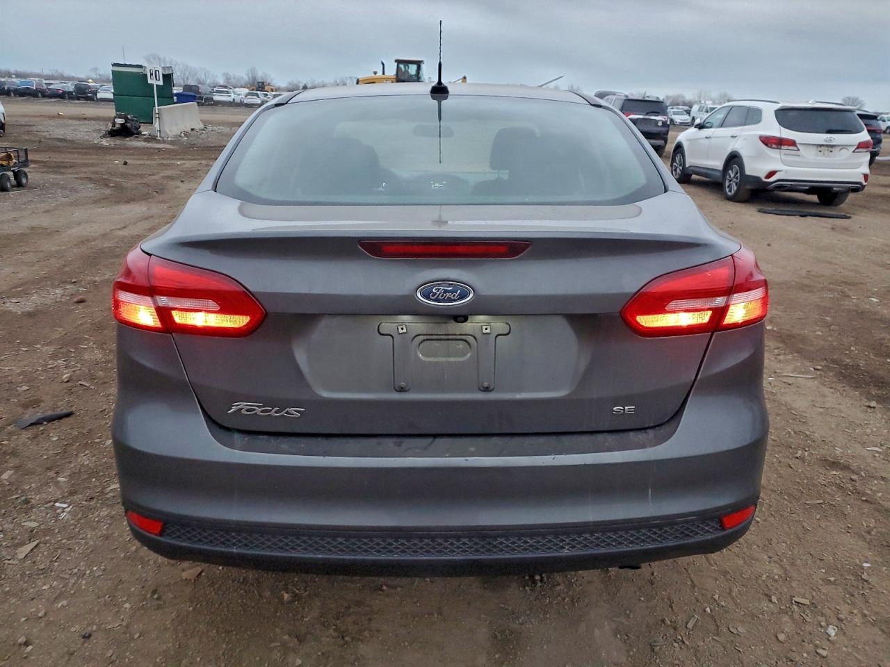 2018 Ford Focus Se VIN: 1FADP3F27JL246959 Lot: 94420205