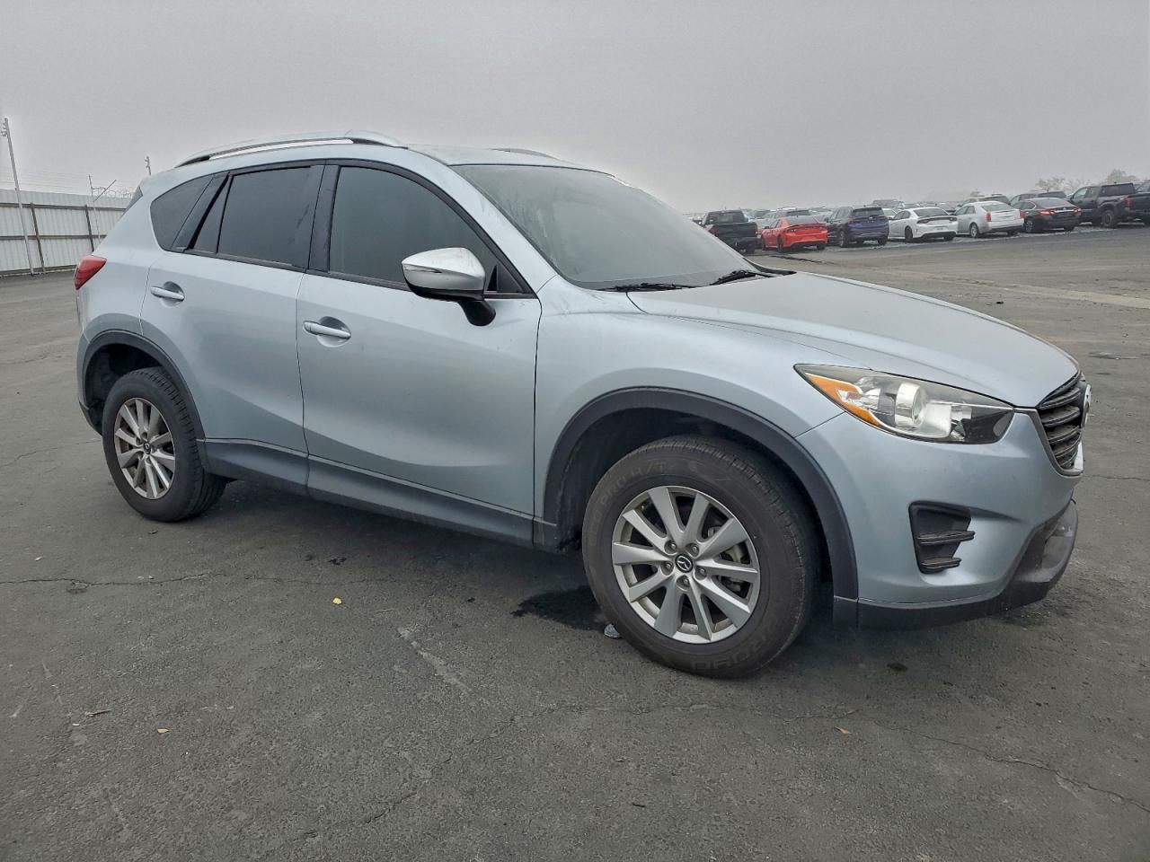 2016 Mazda Cx-5 Sport VIN: JM3KE2BY0G0775389 Lot: 94300235