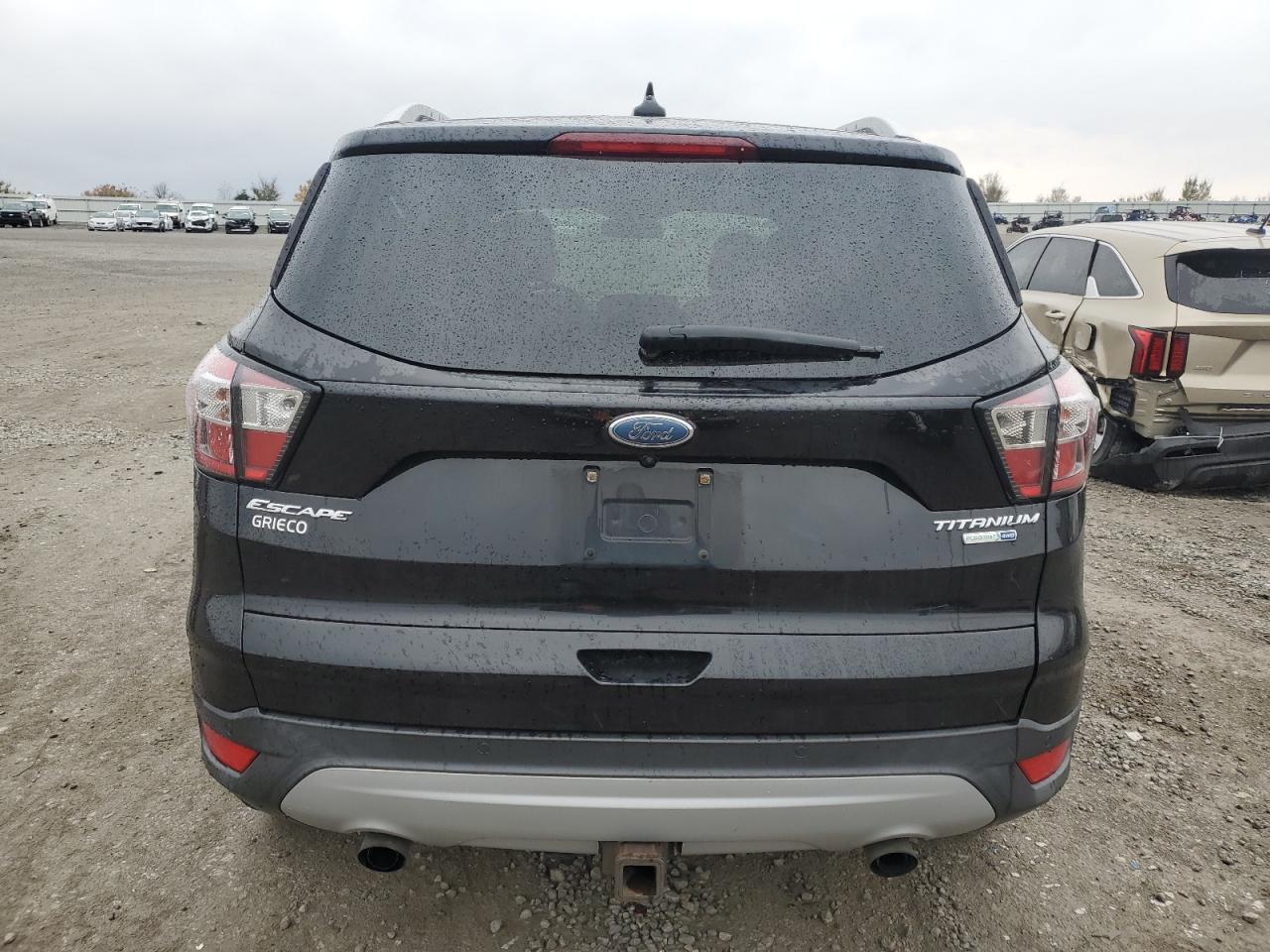 2018 Ford Escape Titanium VIN: 1FMCU9J94JUA33348 Lot: 91296995