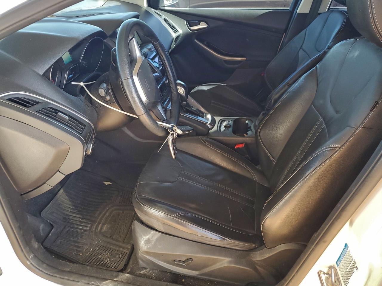 2014 Ford Focus Titanium VIN: 1FADP3N27EL382371 Lot: 93679745