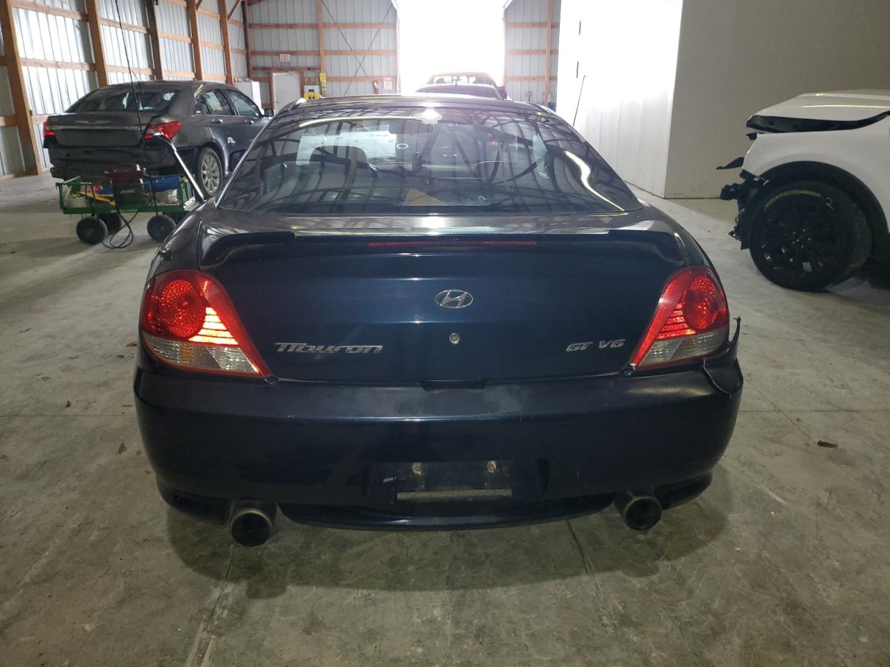 2005 Hyundai Tiburon Gt VIN: KMHHN65F65U169620 Lot: 91893745