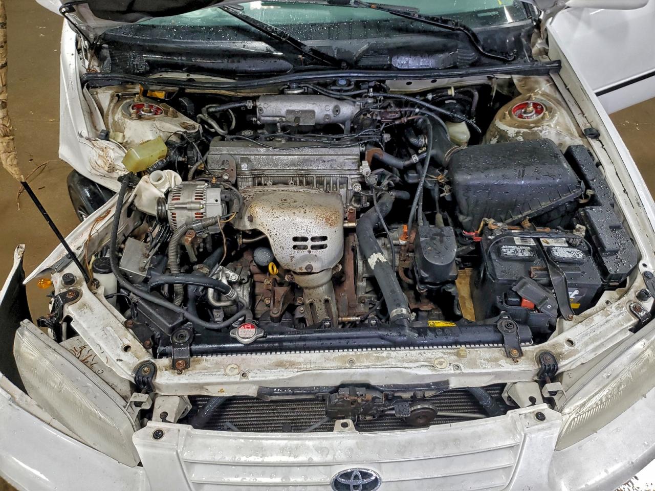 1999 Toyota Camry Le VIN: JT2BG22K5X0374668 Lot: 94445415