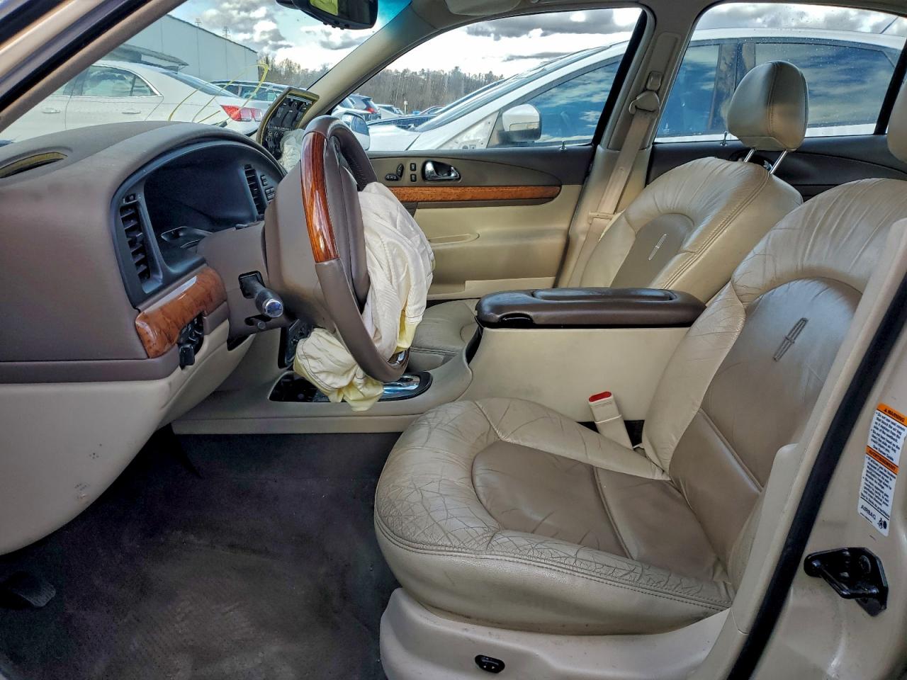 1999 Lincoln Continental VIN: 1LNHM97V8XY715869 Lot: 94039005