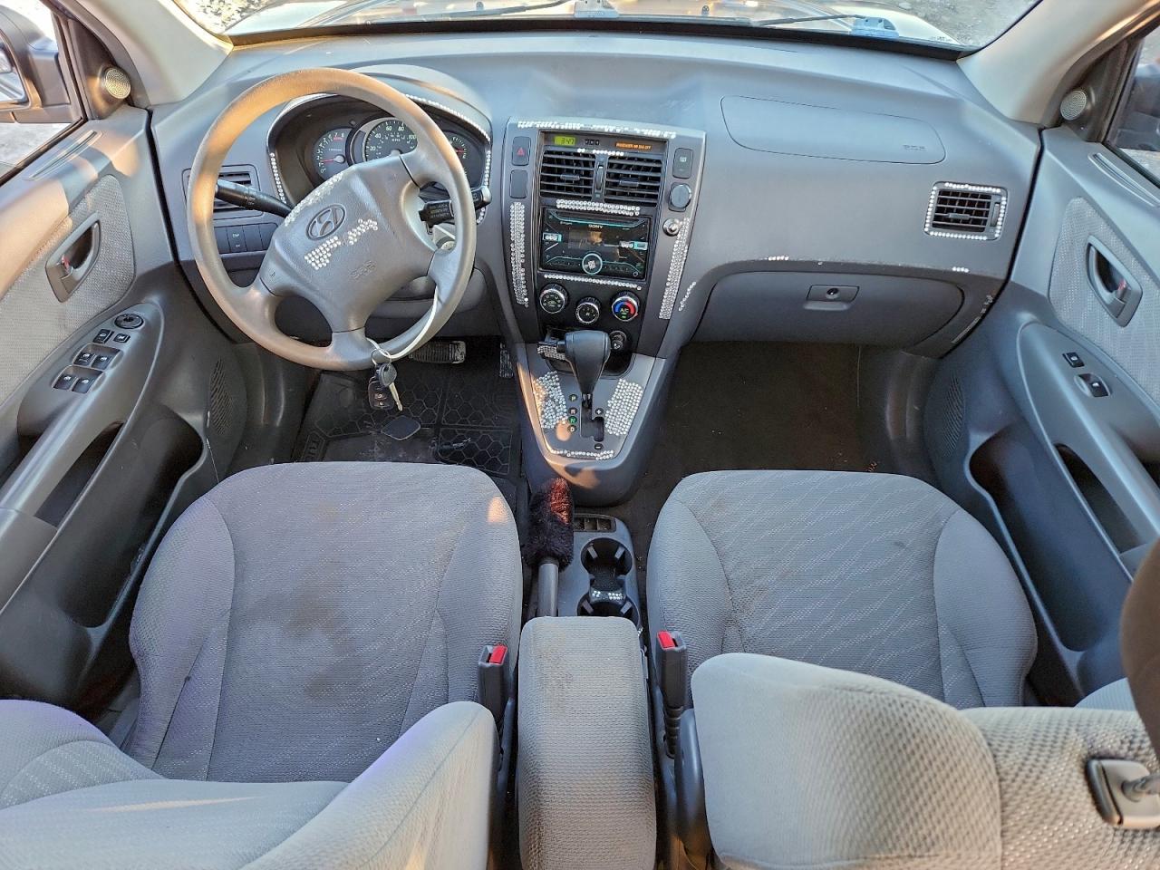 2005 Hyundai Tucson Gl VIN: KM8JM12B75U115249 Lot: 94705575