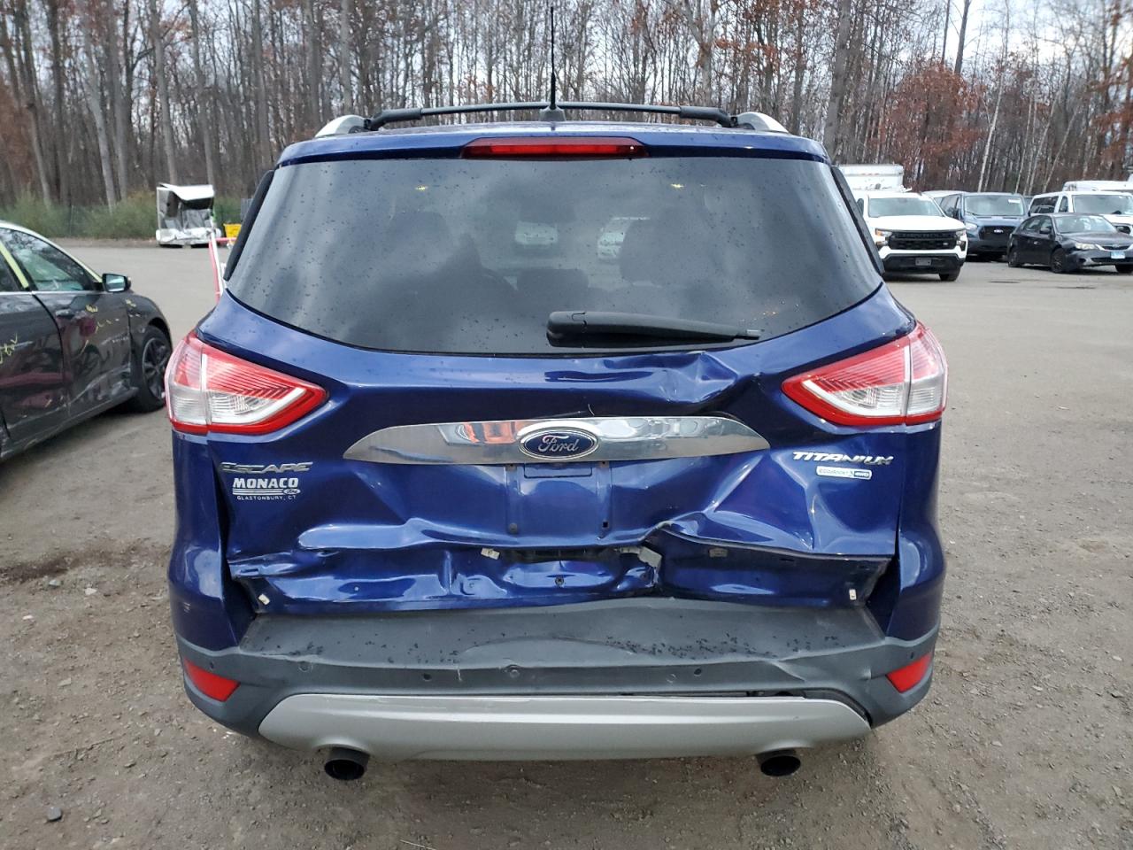 2014 Ford Escape Titanium VIN: 1FMCU9J99EUB74860 Lot: 92855835