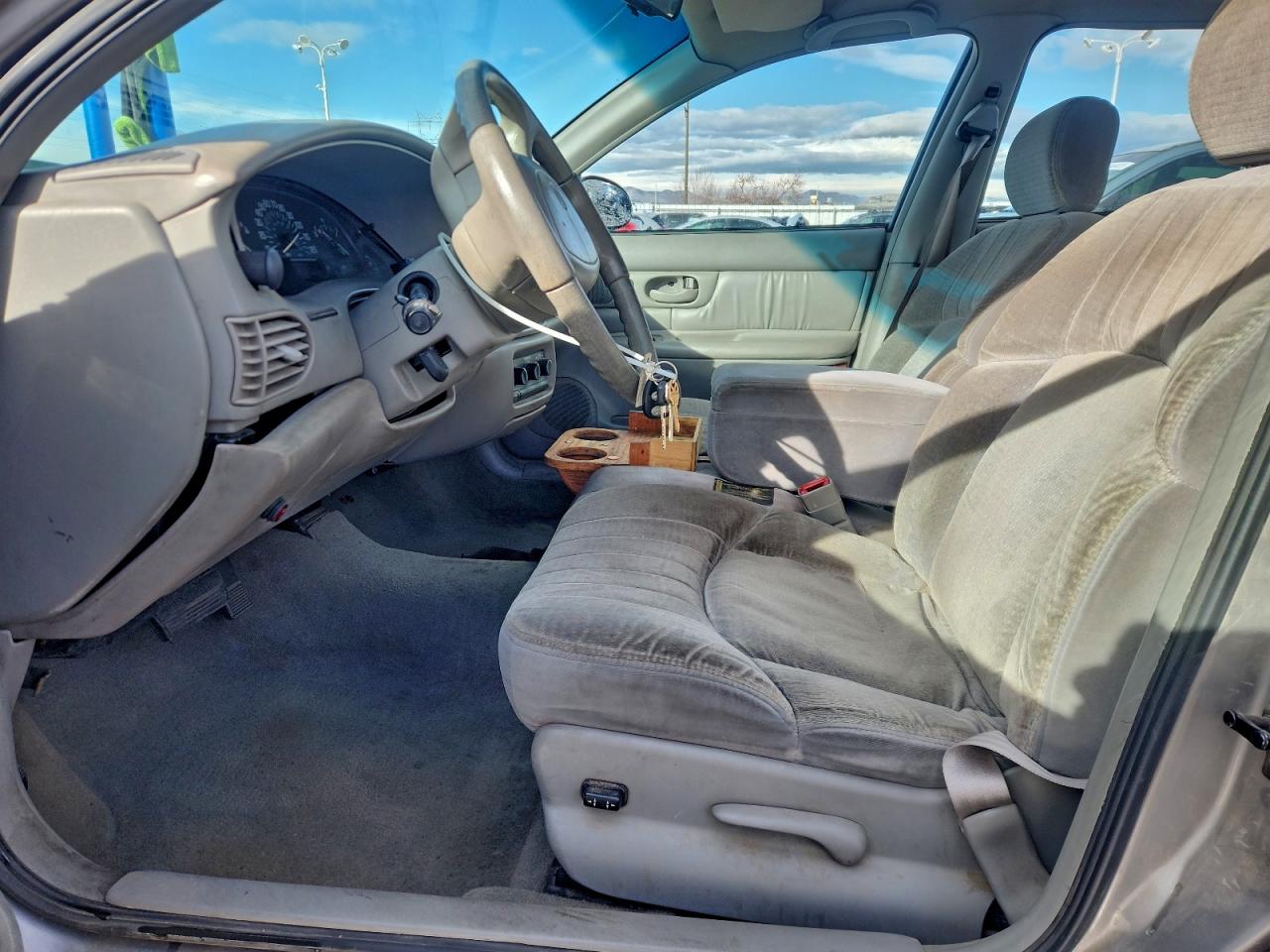 1999 Buick Century Custom VIN: 2G4WS52M2X1500575 Lot: 94318575