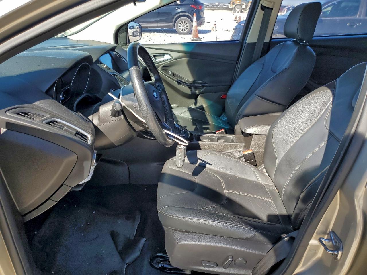 2016 Ford Focus Titanium VIN: 1FADP3N21GL259930 Lot: 94729485