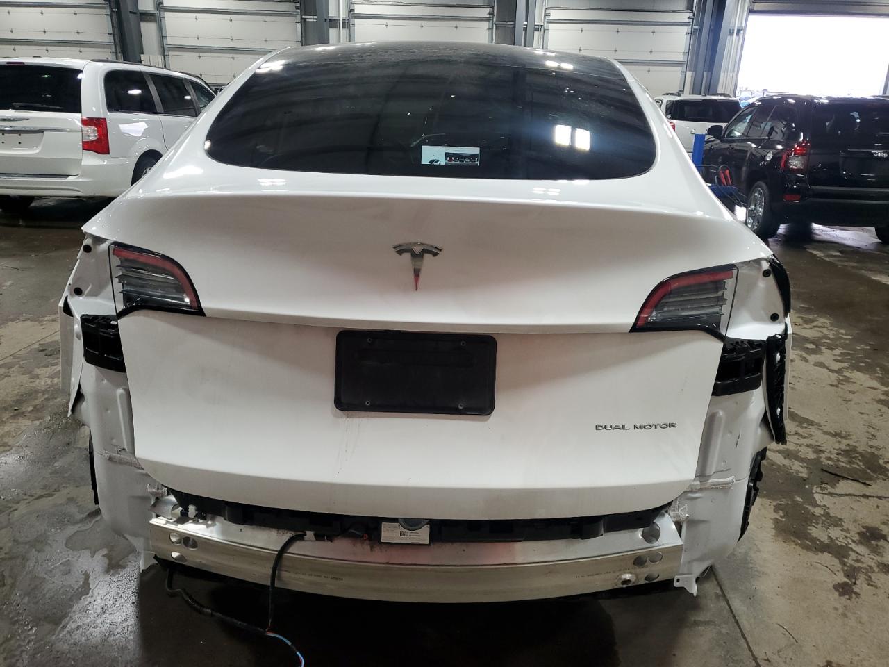 2023 Tesla Model Y VIN: 7SAYGDEE8PF801669 Lot: 92953705