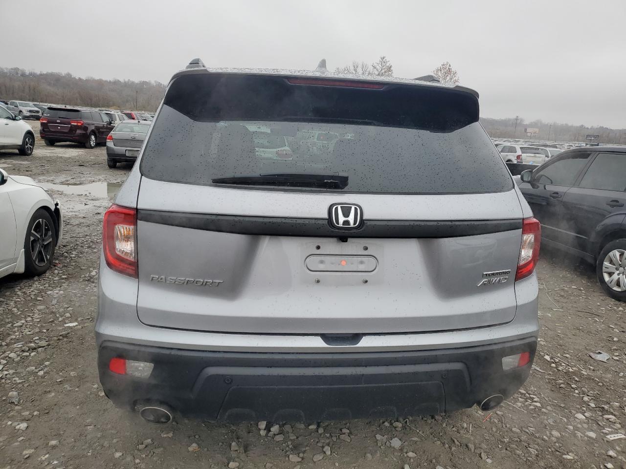 2021 Honda Passport Touring VIN: 5FNYF8H94MB039863 Lot: 93706785