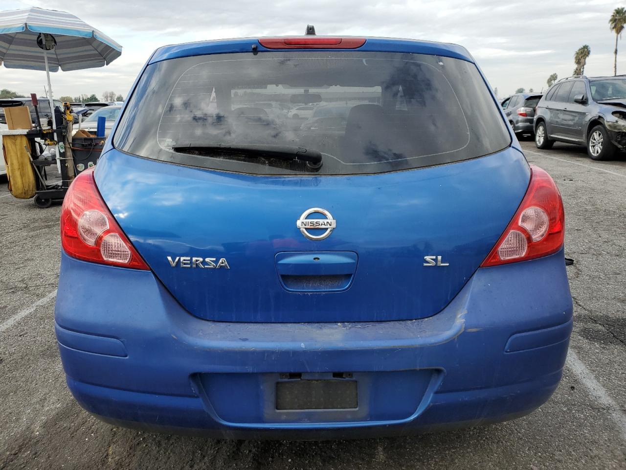2007 Nissan Versa S VIN: 3N1BC13E77L409710 Lot: 92206275