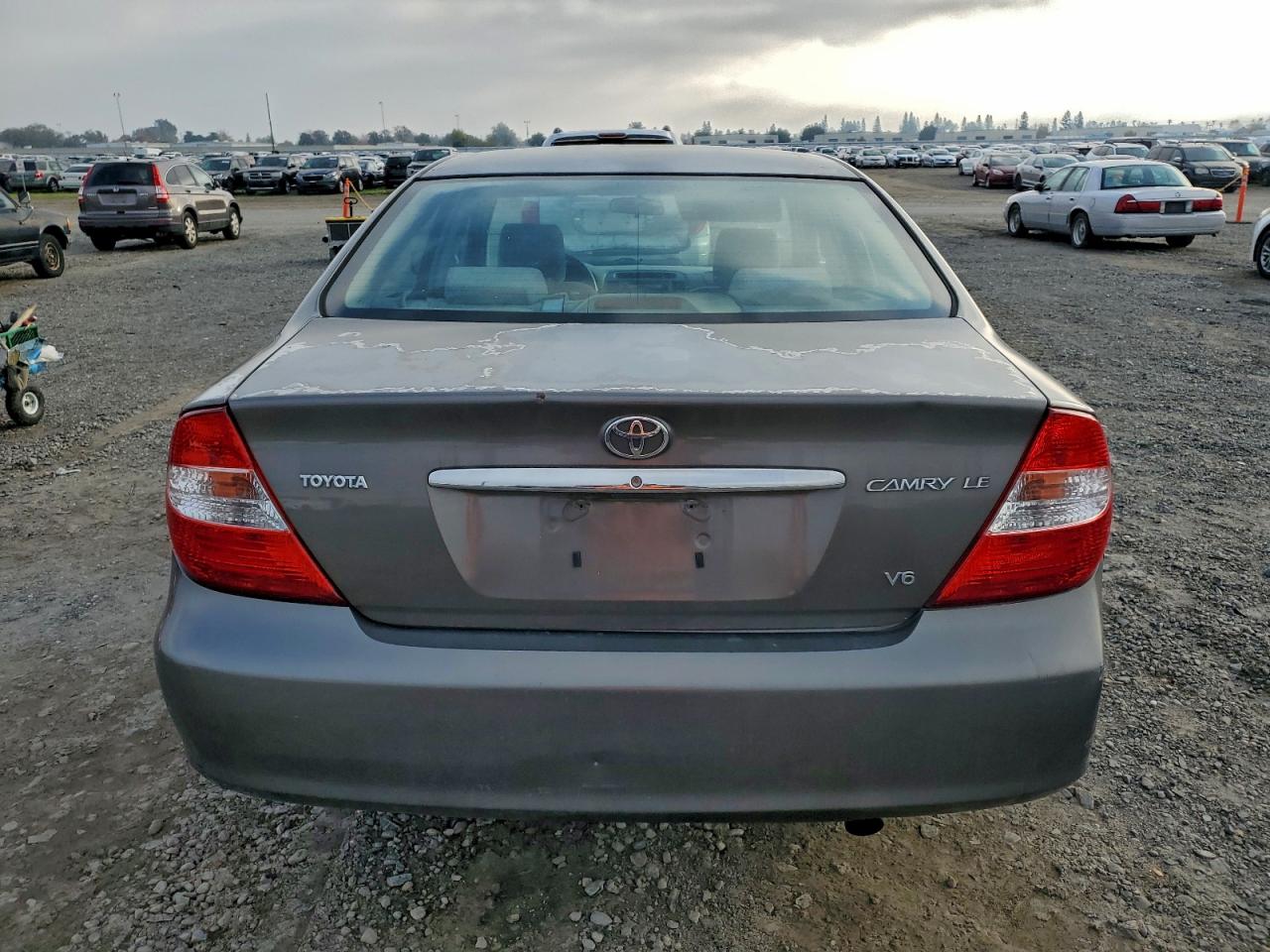 2003 Toyota Camry Le VIN: 4T1BF30K33U560601 Lot: 94110695