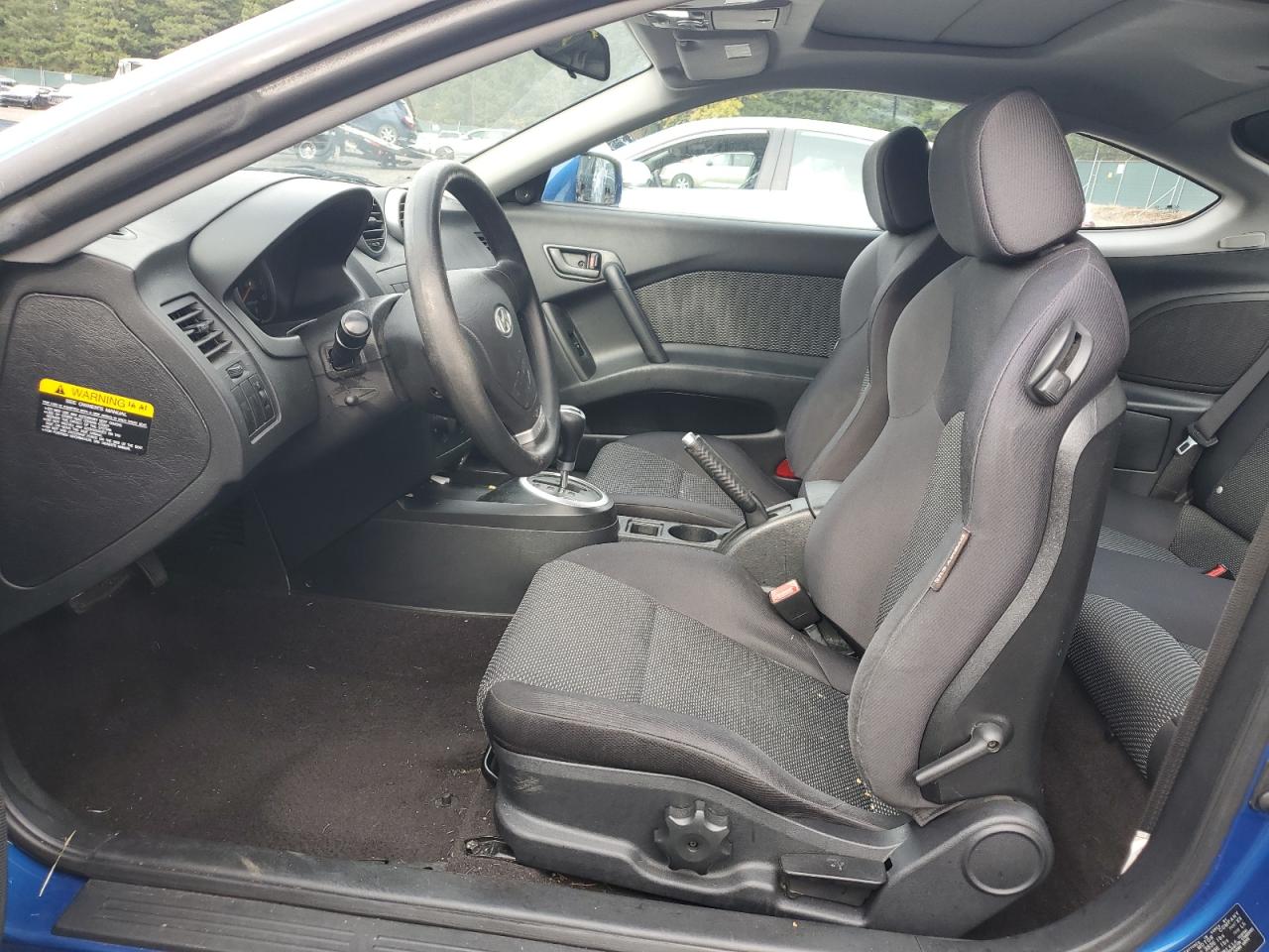 2005 Hyundai Tiburon VIN: KMHHM65DX5U168083 Lot: 91311075