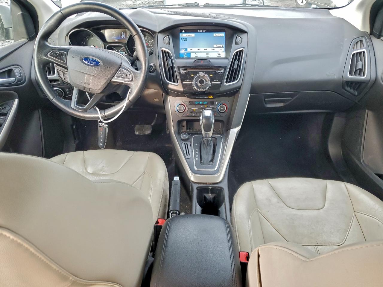 2016 Ford Focus Titanium VIN: 1FADP3N22GL321495 Lot: 94354025