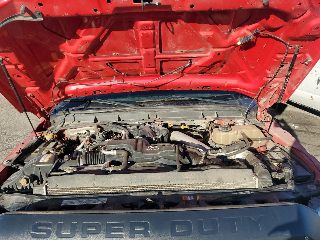 2013 Ford F250 Super Duty Flatbed Truck VIN: 1FTSF2BT1DEA04982 Lot: 93095385