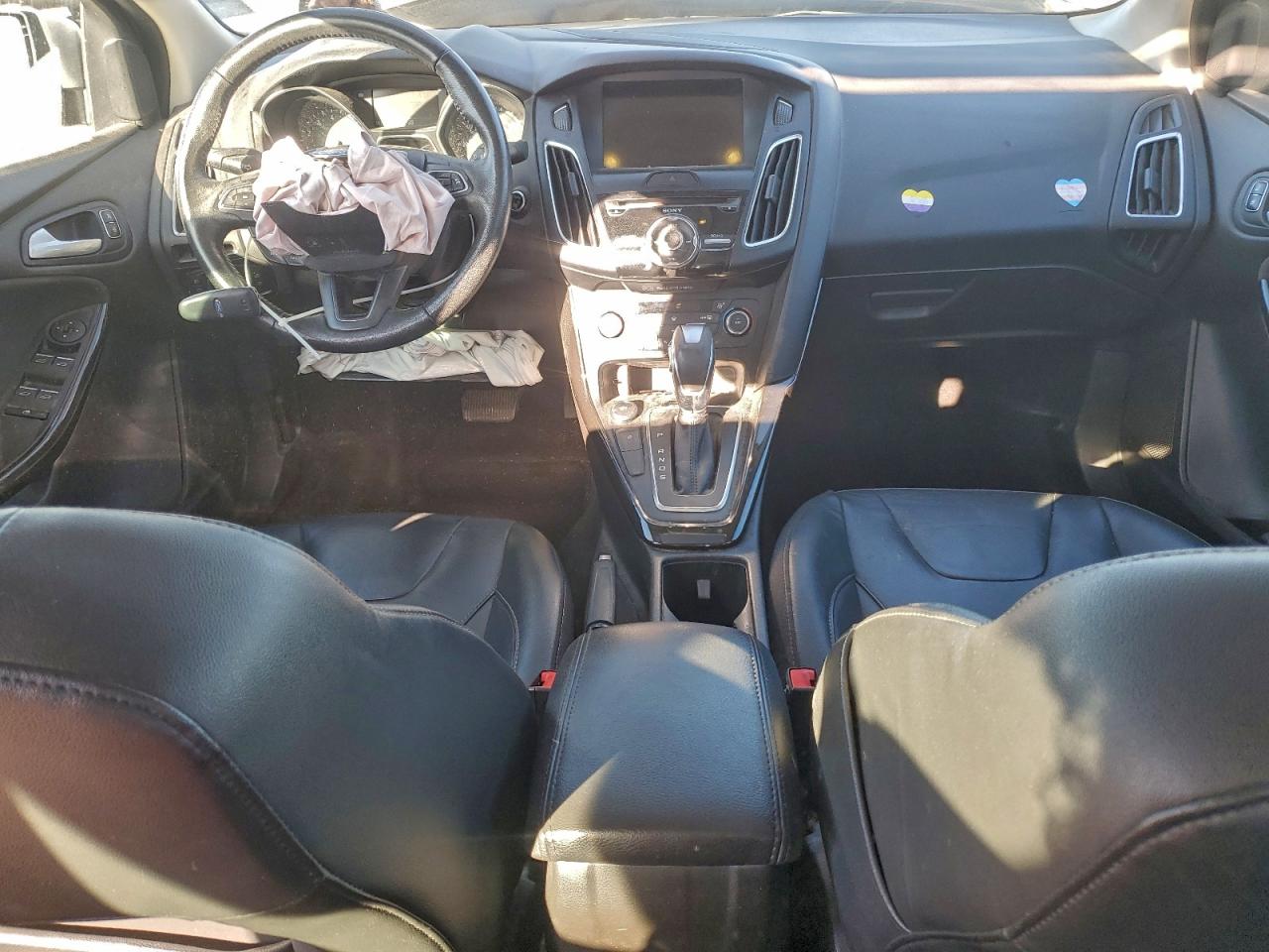 2017 Ford Focus Titanium VIN: 1FADP3J26HL272387 Lot: 94077075