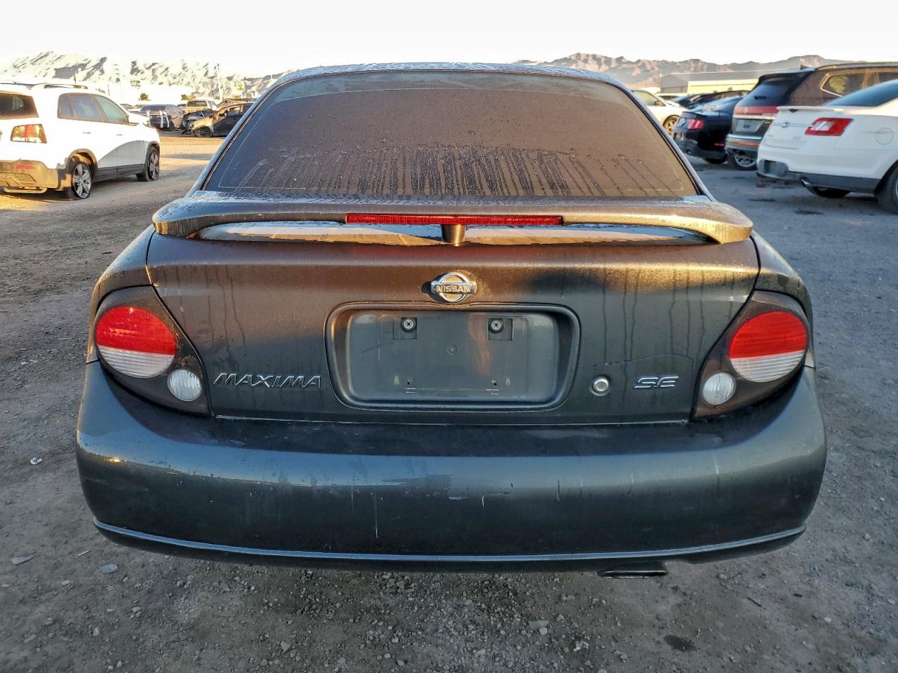 2000 Nissan Maxima Gle VIN: JN1CA31D1YT560409 Lot: 94102525